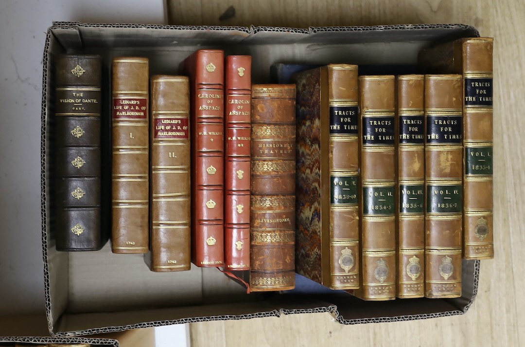 A large quantity of leather bound books including Tracts For The Times, Caroline of Anspach by W.H. Wilkins, Don Quixote, Lives of The Engineers Smile, Pendennis etc.